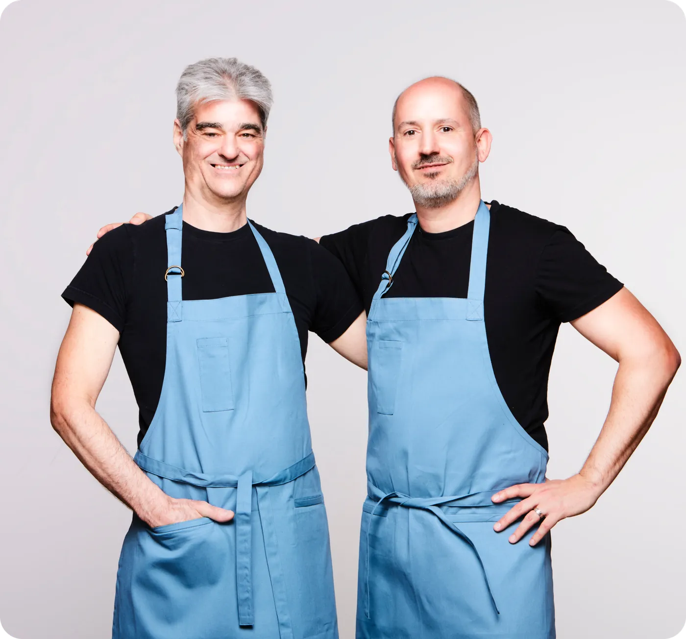 The ÉcoDélys founders wearing aprons